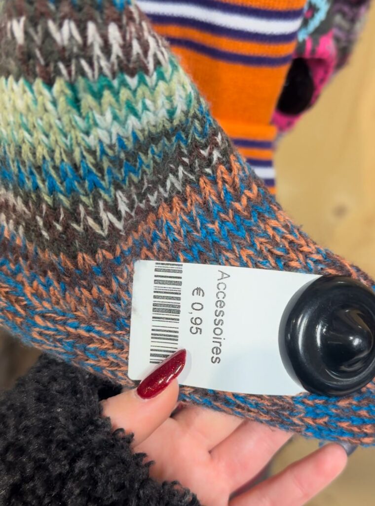 A hat with a price-tag that says "0,95 euros" 