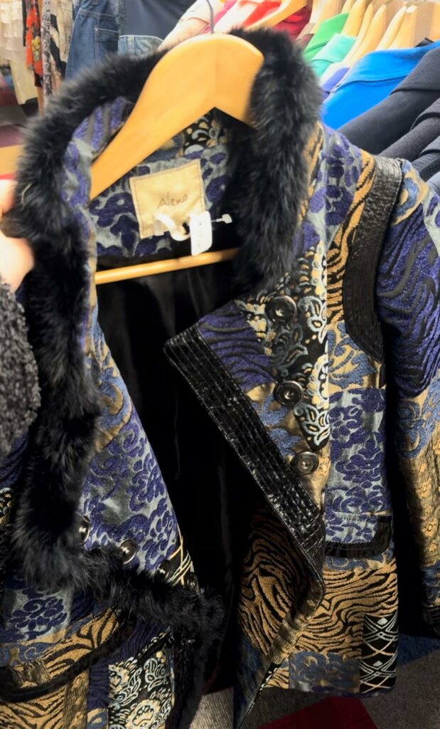 An extravagant blue and gold coat. 